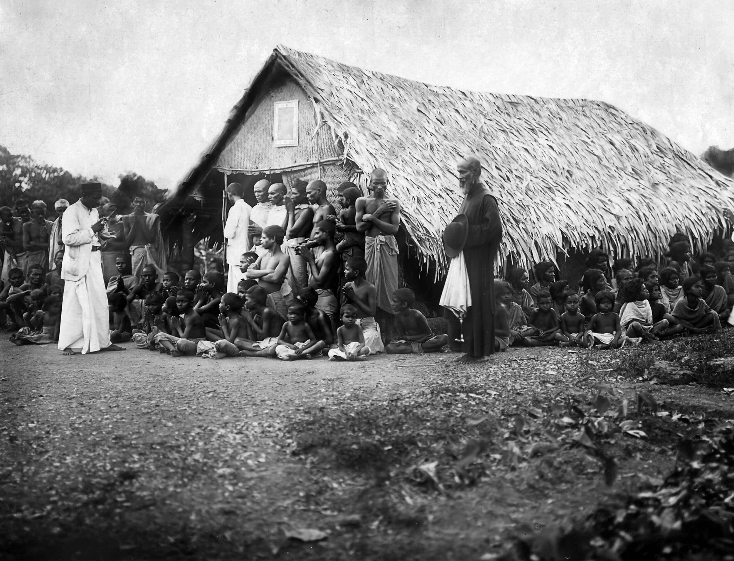 Archival photograph — thatched mission chapel with congregation, Cagayan 1961