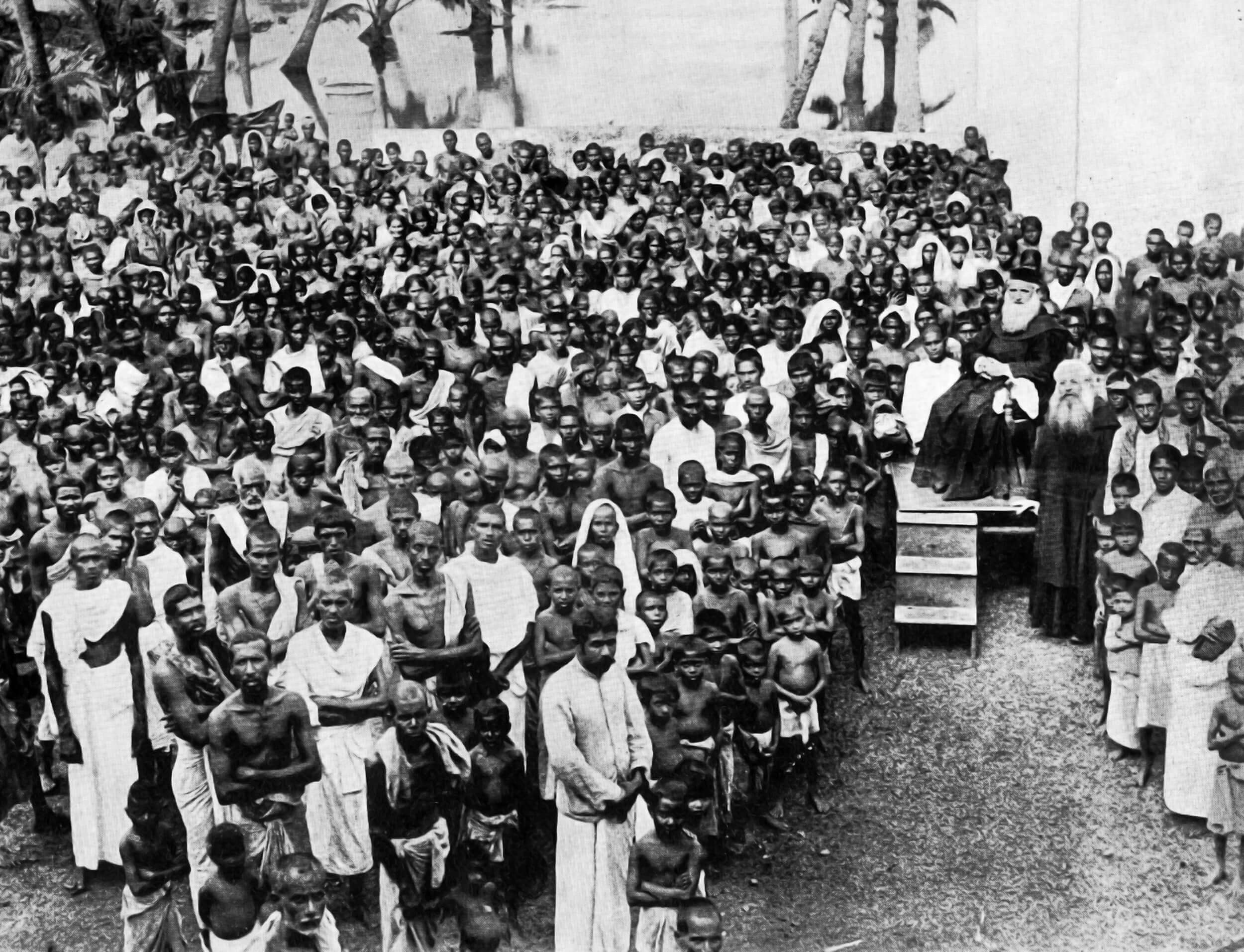 Archival photograph — large crowd, religious procession