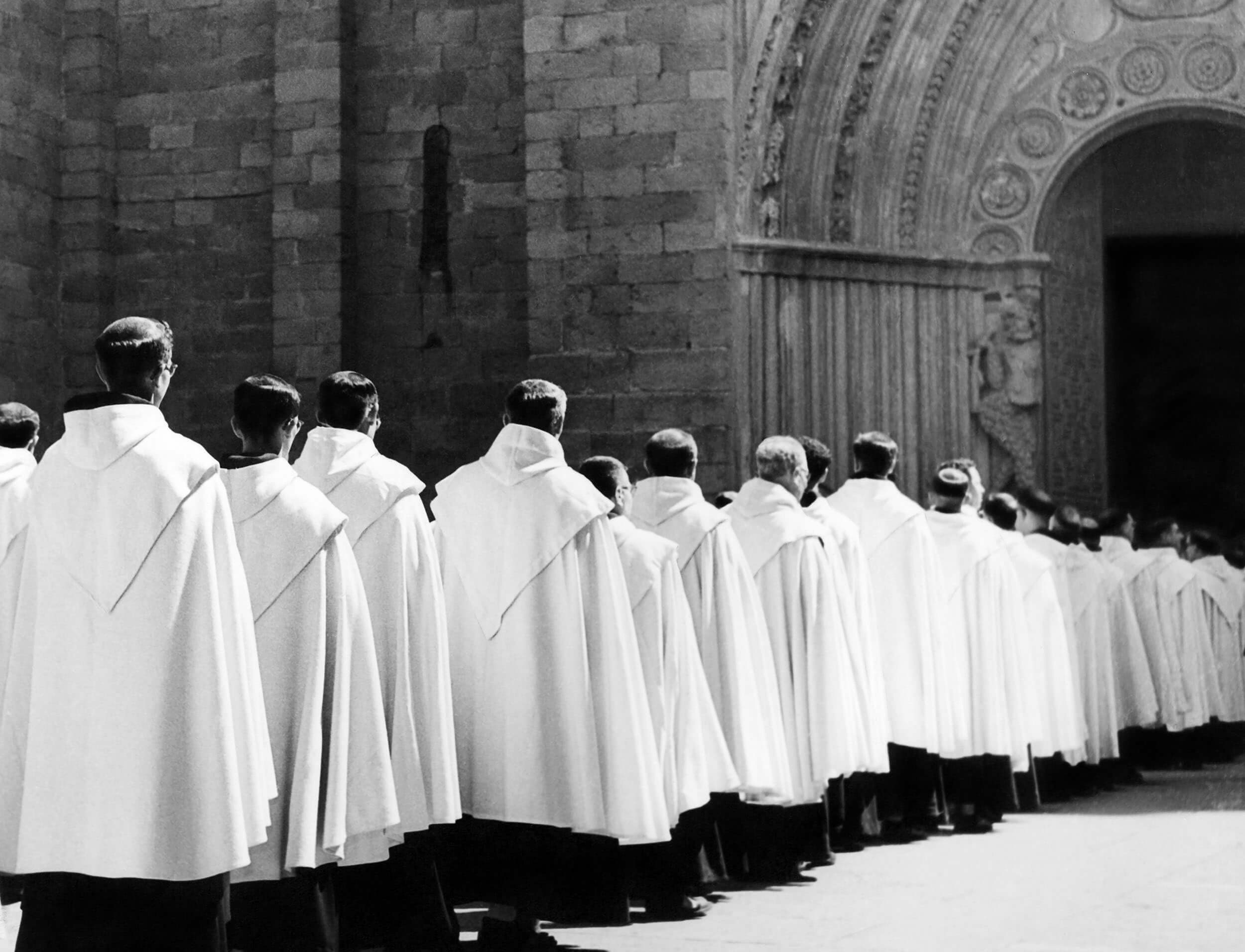 Archival photograph — clergy procession at cathedral entrance
