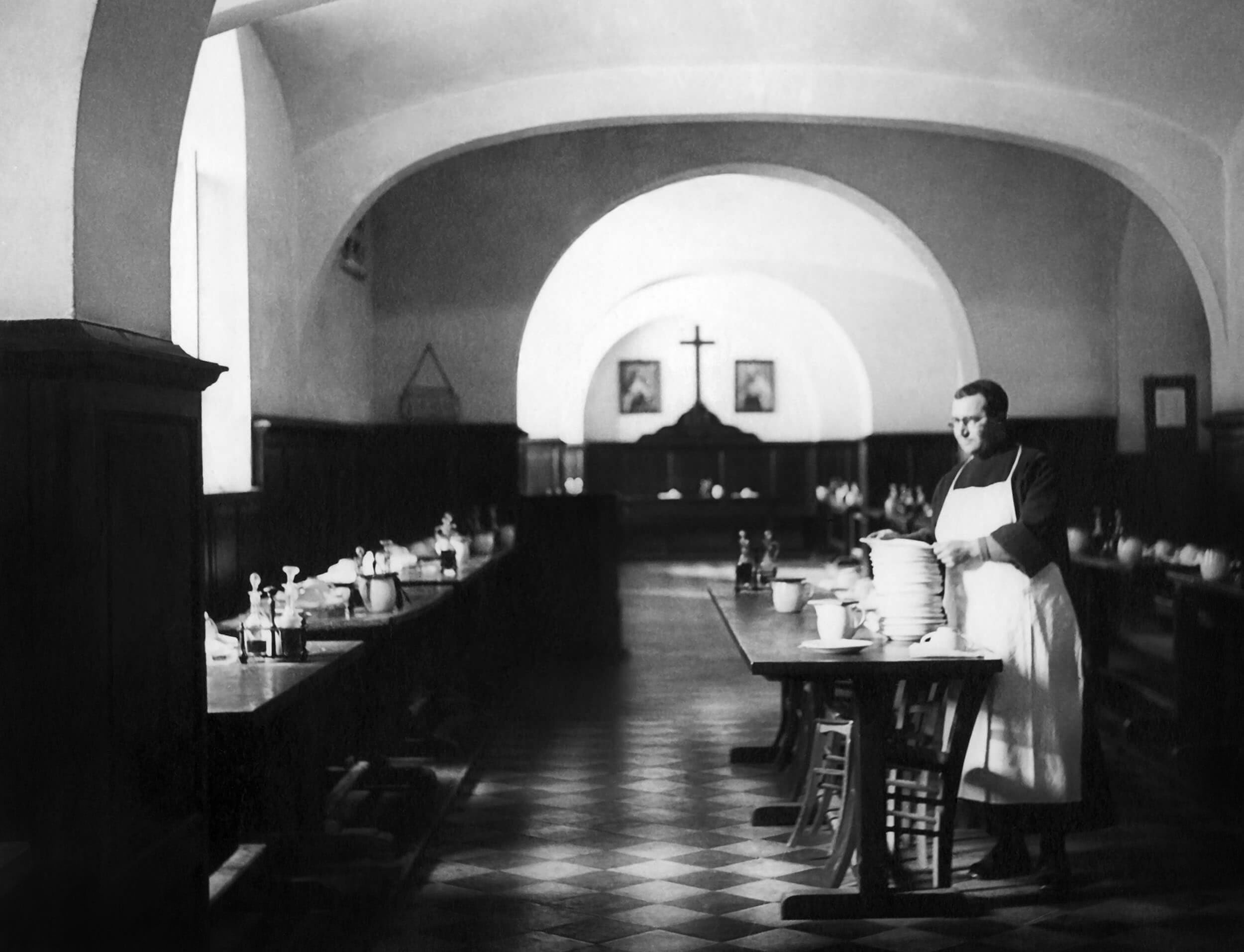 Archival photograph — refectory interior with tables