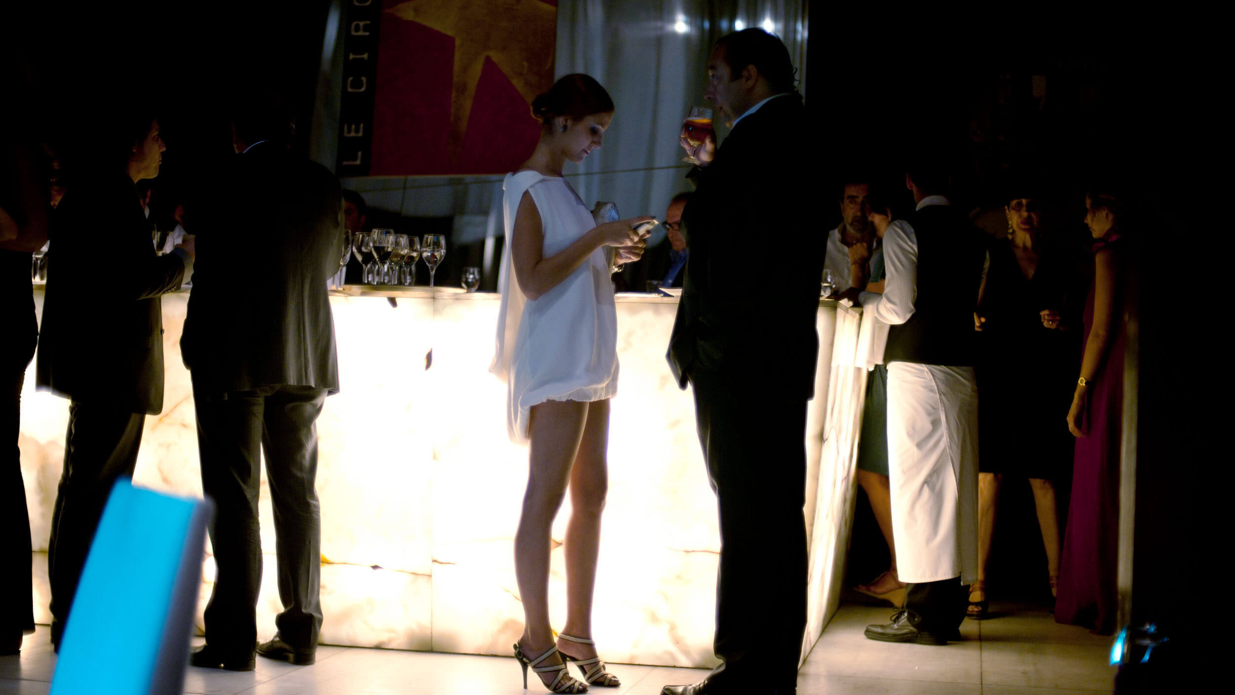 Le Cirque launch event — guests at the illuminated bar