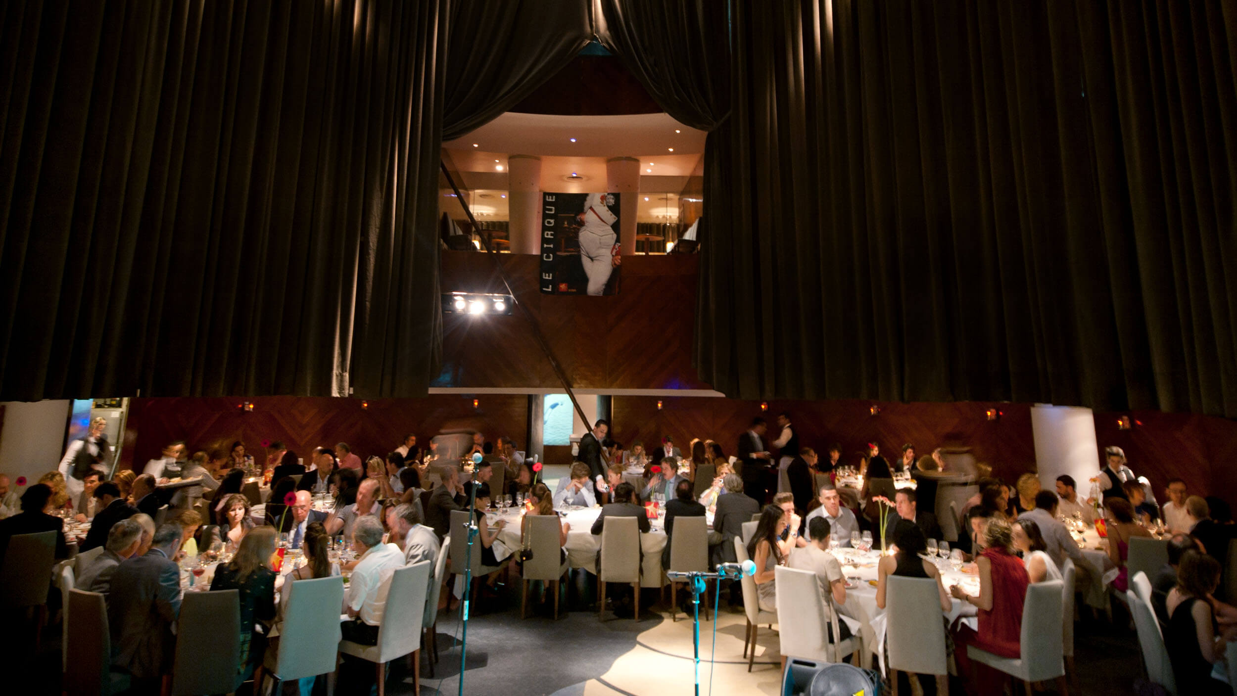 Le Cirque launch dinner — the dining hall beneath the venue's curtains