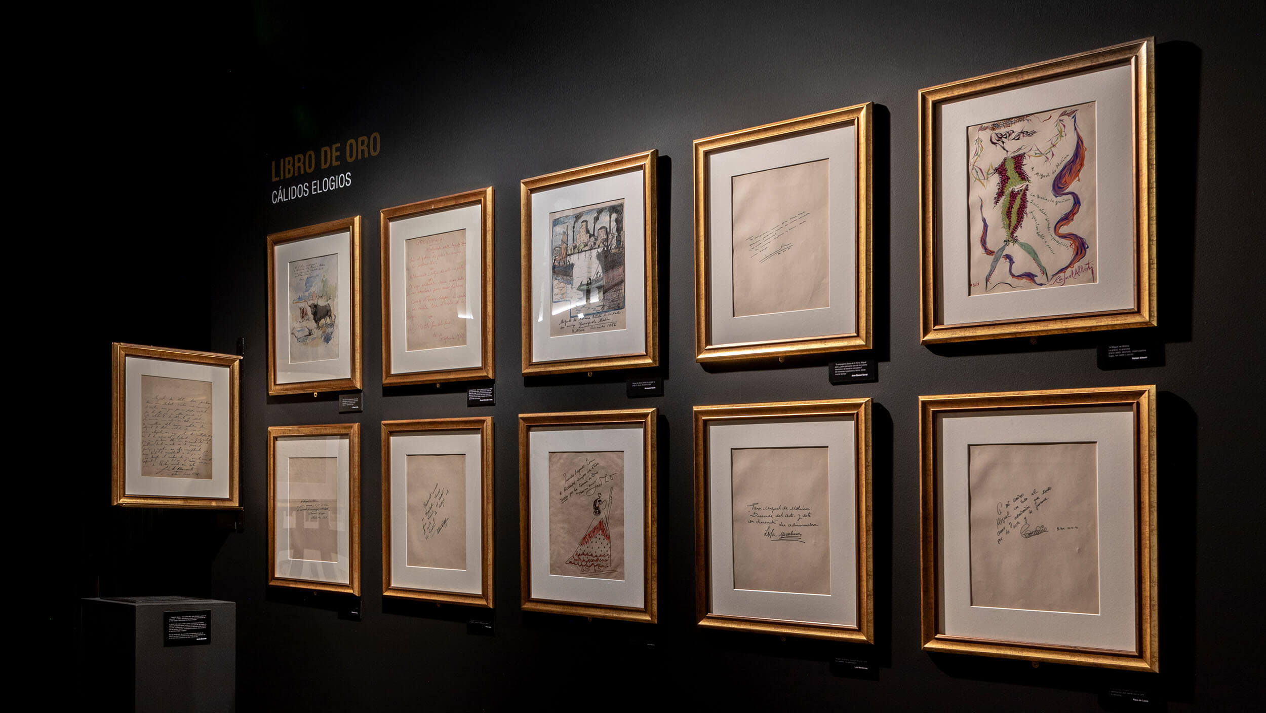 Libro de Oro — gold-framed autographed dedications wall